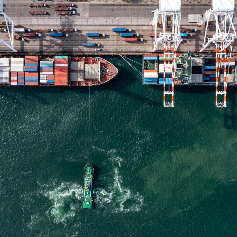 Aerial top view container ship global business logistic transportation import export container box, Container cargo ship boat freight shipping maritime commercial port, Cargo vessel industrial port.